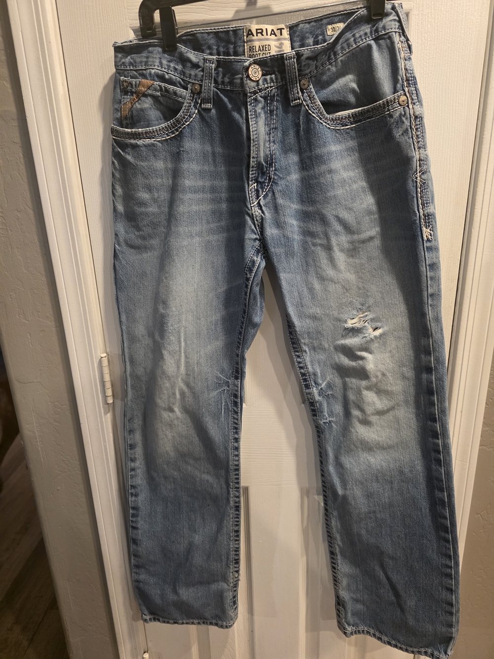 Ariat Men's Relaxed Fit Light Blue Distressed Jeans